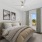 Model Bedroom with natural light and ceiling fan